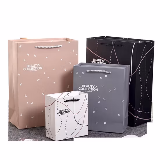 Free Sample Custom Logo Luxury Pink Cardboard Paper Bag with Ribbon Handle